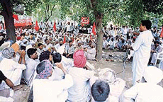 Members of agriculture and rural labour unions stage a massive dharna in front of the Mini-Secretariat 