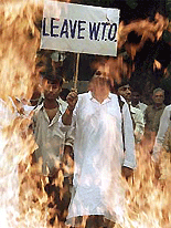 Indian protesters burn foreign goods during a demonstration in New Delhi on Wednesday.