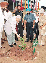 Lieut-Gen J.F.R. Jacob (retd) plants a bahera sapling in the GMCH-32. 