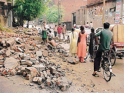 A wall of Sarswati Public School collapsed due to a heavy rain.