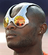 Kwaku Boateng of Canada dons unusual sunglasses during the men's final high jump.