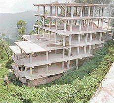 Scores of high-rise buildings dot the Kalka- Shimla Highway ----  Photo by Pankaj Sharma