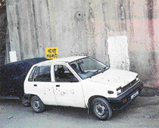 A No parking sign goes unheeded
