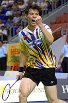 China's Xia Xuanze celebrates after winning his semifinal match against Malaysia's Roslin.