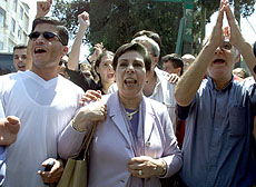 Lawmaker Hanan Ashrawi marches with Palestinians 