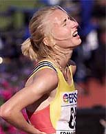 Romania's Gabriela Szabo grimaces after running the women's 5,000 meter final at the World Championships in athletics in Edmonton on Saturday.