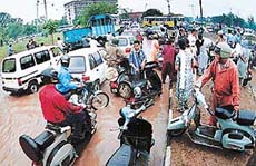A large number of persons get stranded as their vehicles get stalled due to a heavy downpour in Chandigarh on Monday.