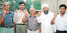 The new team of Punjab University Teachers Association -- Fateh Singh Nandel, Navdeep Goyal, P.K. Mittal, Dhanraj Sharma and Ashwani Sharma -- in Chandigarh on Monday.