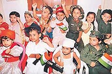 Children dressed up as patriots raise the slogan, Bharat Mata Ki Jai at a function on the eve of the Independence Day, in Evergreen Academy, Sector 34, Chandigarh, on Tuesday.