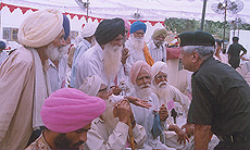 Major-Gen R. K. Kaushal listens to grievances of war veterans.