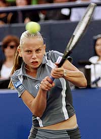 Jelena Dokic of Yugoslavia hits a backhand.
