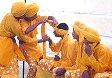 School children getting ready for the show, presented at Amritsar on August 15 to mark the Independence Day.