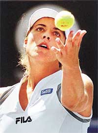 Top seed Jennifer Capriati of the USA watches her service toss.