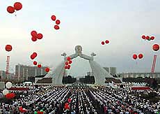 North and South Koreans hold a pro-unification rally.