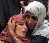 Relatives console a woman.