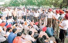 The Deans and Directors of Punjab Agricultural University intervene to pacify the agitating students who locked up the VC office on Friday.