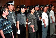 Four suspected members of the banned Falun Gong sect.