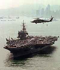A U.S. Navy helicopter goes into land on the USS Constellation as it sails into Hong Kong waters on Monday.