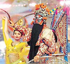 A man in Peking Opera costumes performs at the final rehearsal of the 21st World University Games in Beijing on Tuesday. The Universiade opened on Wednesday. 