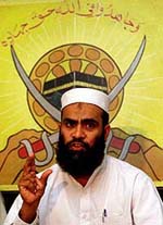 Deputy leader of the Al-Badr Kashmiri militant group Ahmad Hamza speaks to reporters during a news conference in Rawalpindi on Tuesday.