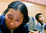 An elderly woman from a village devastated by AIDS in central China