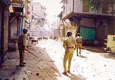 Policemen patrolling the Jordan road
