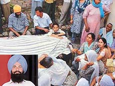Relatives and friends mourn the death of Gurmeet Singh (inset), a dairy owner, who was murdered in Ludhiana on Monday.