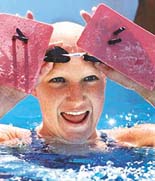 Staciana Stitts of the USA adjusts her goggles during her team's training session in Brisbane on Monday