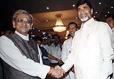 Chief Minister of Karnataka S.M. Krishna with his Andhra Pradesh counterpart N. Chandrababu Naidu at a regional roundtable on Information and Communications Technology (ICT) in Bangalore on Tuesday