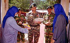 As part of Operation Sadhbhavana, Army officers distribute prizes among students
