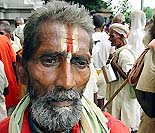 Asharafi Saha, a 85-year-old Nepalese farmer, stands in front of the Indian Museum.