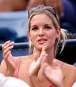 Bridgette Wilson cheers on her husband Pete Sampras 