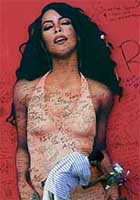 A Fan of singer Aaliyah writes message on a Sunset Boulevard billboard.