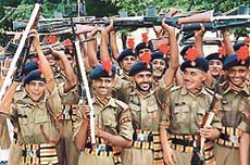 Newly inducted Indo-Tibetan Border Police constables in a joyous mood soon after their passing-out parade in Bhanu, near here, on Thursday. 