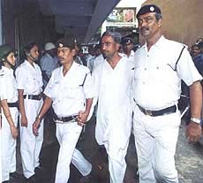 Bowbazar blast accused Rashid Khan being escorted to the city Sessions Court. in Kolkata on Thursday.