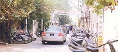 Vehicles parked on both sides of the Major Sham Singh Road in front of GGN Khalsa College, makes it difficult for the residents to pass by. 