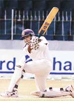 Sri Lankan batsman Mahela Jayawardena hits for four during the third day of third and final Test.