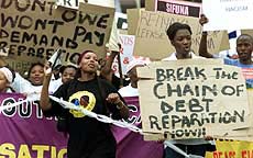 Demonstrators protest outside the opening session of the UN Conference Against Racism on Friday.