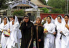 College girls venture out without a veil