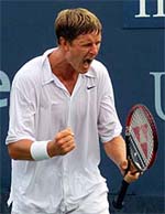 Yevgeny Kafelnikov of Russia celebrates a point against George Bastl 