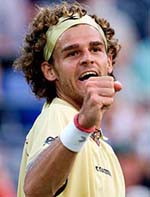 Gustavo Kuerten of Brazil celebrates a point in his win over Kristian Pless