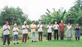 The Rose Garden group-claps hands in delight.
