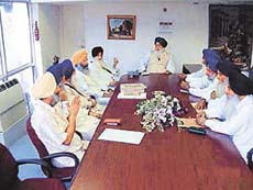 Mr Parkash Singh Badal chairs a meeting of the SAD political affairs committee in Chandigarh on Monday.