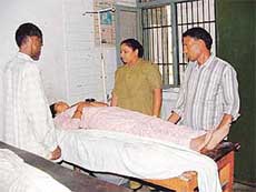 The injured woman talks to a woman constable in a hospital in Ludhiana on Monday. 