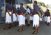 Fijian police listen to a debriefing from their commander 