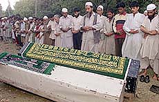 Kashmiri Muslim villagers offer Nimaz-e-Jinazah
