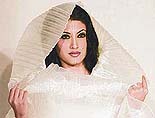 A model displays a creation by Indian designer Hemant Trivedi during a fashion show in Mumbai, on Wednesday. 
