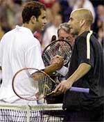 Pete Sampras (left) is congratulated on his 6-7 (7), 7-6 (2), 7-6 (2), 7-6 (5) win over Andre Agassi.