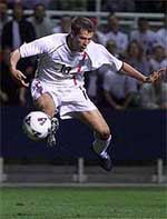 England's Michael Owen controls the ball before scoring against Albania 