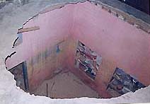 The large hole shows the roof which collapsed claiming the life of a girl and injuring four children in Sarafa Bazar, Ambala city on Friday evening.